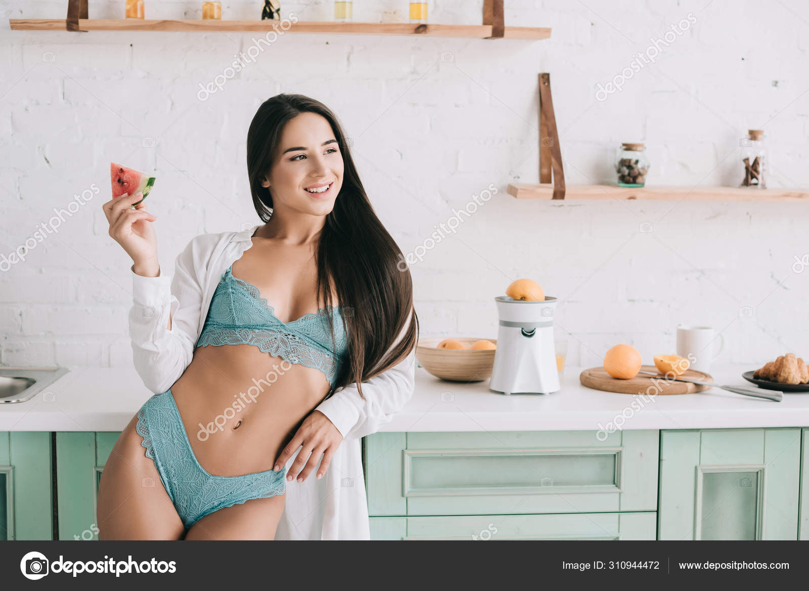 depositphotos_310944472-stock-photo-happy-sensual-girl-lingerie-white