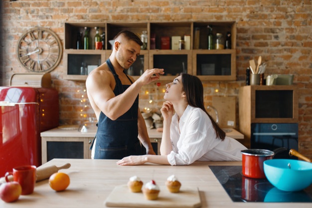 attractive-love-couple-in-underwear-cooking-on-the-kitchen-together-naked-man-and-woman-preparing-breakfast-at-home-food-preparation-without-clothes_266732-5812